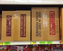 Boxes of instant noodles on a supermarket shelf, with the words "First In First Out / Retain Freshness" written on them Boxes of instant noodles on a supermarket shelf, with the words "First In First Out - Retain Freshness" written on them.jpg