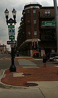 A reassurance marker for the Capitol Loop at the corner of Michigan Avenue and Cedar Street in Lansing