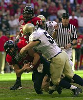 Kicker de 130kg garante título no futebol americano universitário