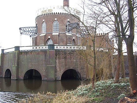 Back of Museum De Cruquius near Amsterdam, an old pumping station used to pump dry the Haarlemmermeer. It shows the beams of the pumping engine and the 9 meter drop in water level from the Spaarne river. The beam engine is the largest ever constructed, and was in use till 1933.