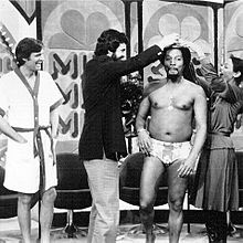 Farrell conducting a "men's beauty contest" on the Mike Douglas Show with Alan Alda, Billy Davis Jr., and Marilyn McCoo, c. 1976. Dr. Warren Farrell on the Mike Douglas Show, circa 1976.jpg