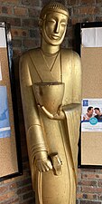 La statue de saint Éloi en plâtre doré.