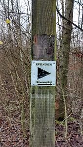 A waysign erected by the Eifel Club on a path in Eschweiler Eifelverein Wegweiser.jpg