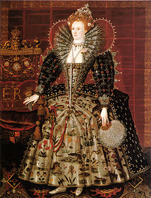 Elizabeth I of England c.1599, standing on an Oriental carpet. Studio of Nicholas Hilliard. Elizabeth I of England Hardwick 1592.jpg