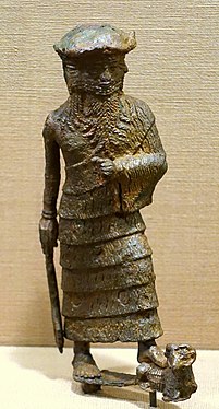 Déu de quatre cares, Ishchali. Isin-Larsa fins als períodes de l'antiga Babilònia, 2000-1600 aC. Estàtua de bronze. Museu de l'Institut Oriental, Universitat de Chicago