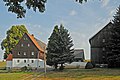 Residential stable house and two barns in a three-sided courtyard