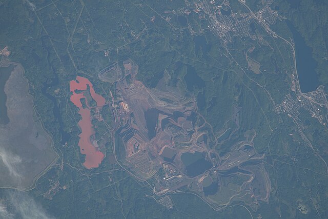 The Tilden and Empire mines south of Ishpeming and Negaunee, taken on July 2, 2022, from the International Space Station; north is oriented towards th