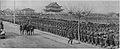 Japanese soldiers standing at attention on both sides of Nanking's main thoroughfare