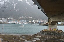 Photo taken below the bridge, facing east from Douglas Island, shows the bridge's superstructure and support column above Gastineau Channel. Juneau, Douglas 11 February 2011 007.jpg