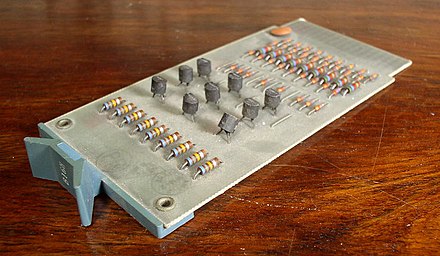 A "B" (blue) series Flip Chip module containing nine transistors, 1971
