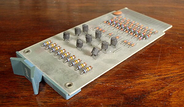 Flip Chip from a DEC KA10, containing 9 transistors, 1971