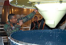 Missile Maintainer inspects missile guidance system of the LGM-30G Minuteman ICBM Missile Maintainer inspects missile guidance system of the LGM-30G Minuteman ICBM.jpg