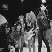 The New York Dolls in 1973. Their visual style influenced the look of many 1980s-era glam metal groups. New York Dolls - TopPop 1973 11.png