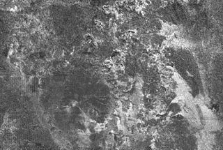 <span class="mw-page-title-main">Macula (planetary geology)</span> Unusually dark area on the surface of a planet or moon