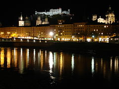 The fortress (background), Salzburg Cathedral (middle), the Salzach (foreground)