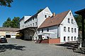 Mill property with mill building, residential mill house (No. 2), stable house, barn, younger residential building (No. 1, former moving house), weir and parts of the technical equipment (including Siemens-Schuckert engine)