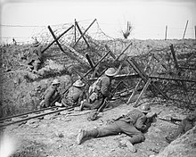 The Battle of the Lys. A picquet of the 10th (Service) Battalion, Queen's (Royal West Surrey) Regiment of the 41st Division behind a wire "block" on a road at St. Jean, 29 April 1918. The German Spring Offensive, March-july 1918 Q6595.jpg