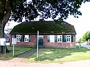 Village school with farm building