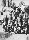 Members of the 2/7th Armoured Regiment with a M3 Grant tank