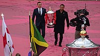 Men's World Cup trophy being brought out at the opening ceremony by Kevin Sinfield and Jason Robinson 2021 RLWC Opening ceremony - trophy brought out by Sinfield & Robinson.jpg