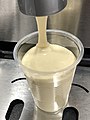 2022-05-01 06 40 27 Waffle batter being poured into a cup at the Wingate by Wyndham in Chantilly, Fairfax County, Virginia.jpg