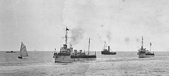 Kabyle, followed by another Arabe-class destroyer, in Le Havre, 1921 25-7-1921, Le Havre, revue navale, les torpilleurs d'escadre - Kabyle (cropped).jpg