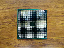 AMD Athlon II P320 with Socket S1 layout AMD AMP320SGR22GM pins (15502936987).jpg