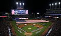 A giant American flag is unfurled before Game 1 of the 2016 World Series at Progressive Field. (29942765864).jpg
