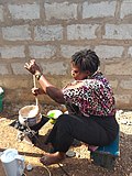 Thumbnail for File:A woman stirring TZ.jpg