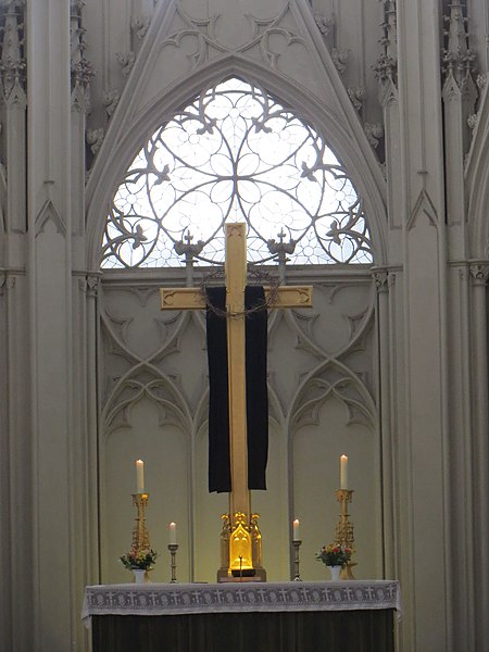 High altar, barren, with few adornments, as is custom during Lent