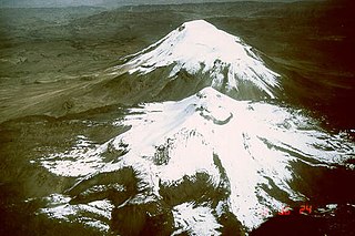 Two tall snow-covered mountains