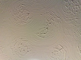 <span class="mw-page-title-main">Artex</span> Trademark; surface coating used for interior decorating, most often found on ceilings