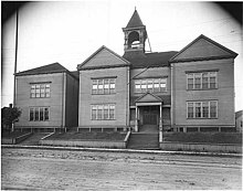 Ballard High School was founded in this long-gone building on Tallman Avenue, in 1901. Ballard High School, Seattle, ca 1914 (MOHAI 36).jpg