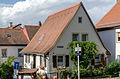 Single-storey saddle roof construction