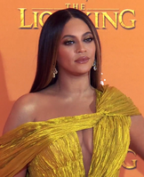 Beyonce was honored with the Entertainer of the Year Award Beyonce at The Lion King European Premiere 2019.png