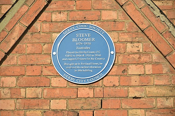 Blue Plaque commemorating the life of Steve Bloomer in Derby, sited on the corner of Peartree Street and Portland Street.