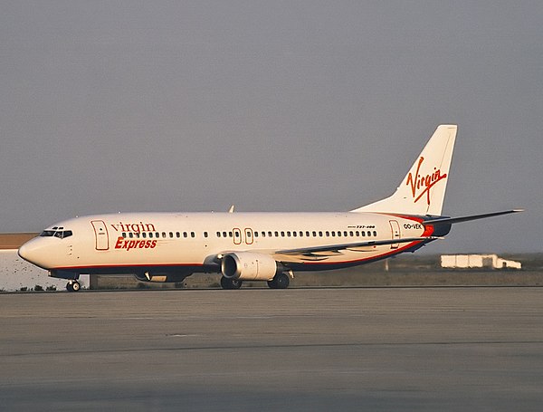 A Virgin Express Boeing 737-400 parked at Faro Airport in 1999