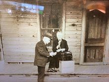 Frank Clyde Brown records a North Carolina folk artist using his personal ediphone. This ediphone is now housed in the Rubenstein Library at Duke University. Brown on a Porch..jpg