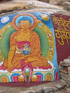 Buddha painted on a rock wall in Tibet.jpg