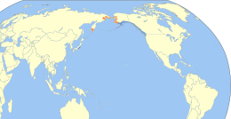 Área de distribución de Calidris ptilocnemis Alaranxado: Área de cría. Violeta: Presente todo o ano. Azul: Área onde non se reproduce.
