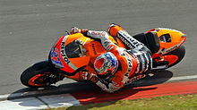 Casey Stoner racing for Repsol Honda at the 2011 Malaysian Grand Prix. Casey Stoner - Repsol Honda Team (5480226329).jpg