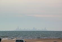 The Chicago skyline viewed across Lake Michigan from Lake Street Beach in Gary's Miller Beach neighborhood Chicago from Miller.jpg