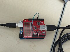 A USB host shield which allows an Arduino board to communicate with a USB device such as a keyboard or a mouse