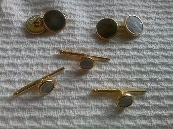 Gold and cuff links and shirt studs