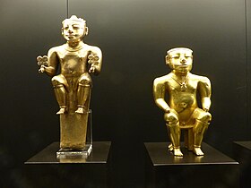 Two statues caciques sitting on stools; Museum of the Americas (Madrid, Spain)