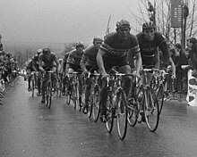 Eddy Merckx and Erik de Vlaeminck leading the peloton Eddy Merckx and Erik de Vlaeminck, Amstel Gold Race 1970 (cropped).jpg