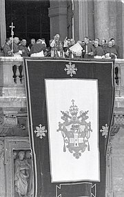 Pope Paul VI appears on the central loggia after his election Election of Pope Paul VI.jpg