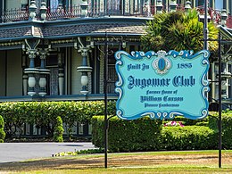 The club's sign in 2018 with the mansion in the background. EurekaHistoricDistrict-CarsonMansion3.jpg