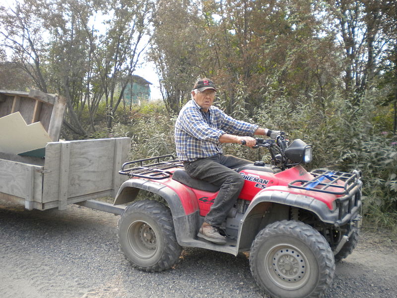 File:FEMA - 41719 - Disaster Survivor Bringing Debris From His Home.jpg