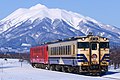 * Nomination Mt. Iwaki in the snow and Kiha 40/48 series diesel train on the Gono line. --MaedaAkihiko 04:56, 27 July 2021 (UTC) * Promotion  Support Good quality. --Tournasol7 05:06, 27 July 2021 (UTC)